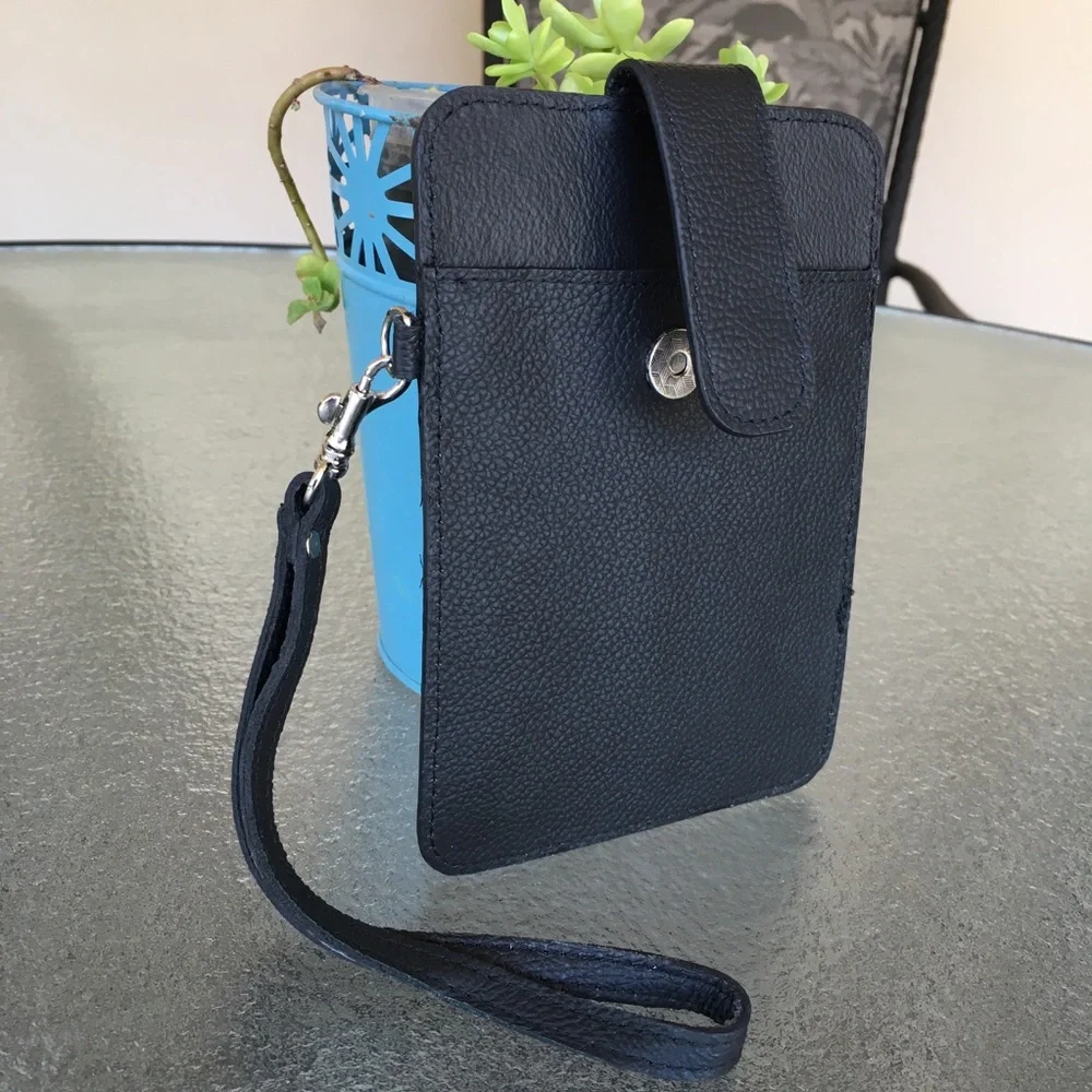 GENUINE LEATHER PHONE CASE AND WALLET.